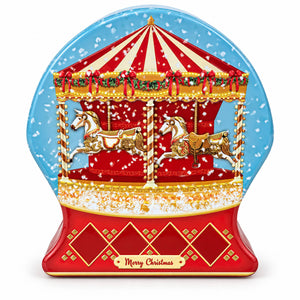 A Christmas-themed snow globe decoration featuring a red and gold carousel with white horses under a blue snowy sky, with 'Merry Christmas' written on the base.