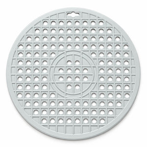 A round, light gray plastic trivet or mat with a grid pattern of circular cutouts and a small hanging hole at the top, shown on a plain white background.