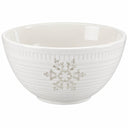 A white ceramic bowl with a ribbed exterior, featuring a metallic silver snowflake design on the front, set against a plain white background.