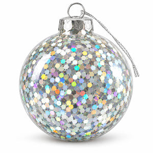 A clear glass Christmas ornament ball covered in dense iridescent silver glitter, with a silver hanging loop and string, shown on a white background.
