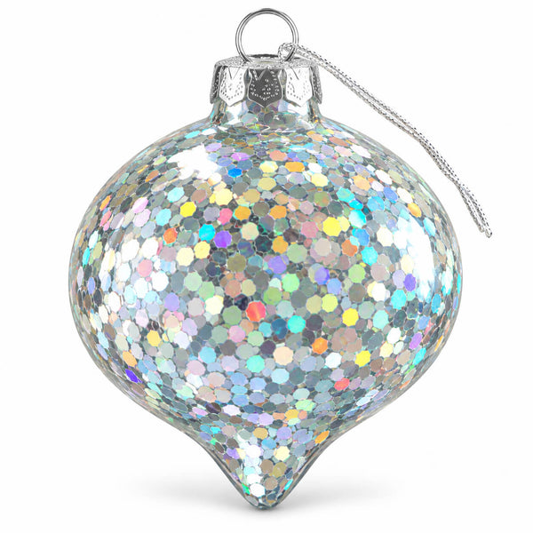 A silver-toned glass Christmas ornament covered in dense iridescent hexagonal glitter, with a silver metal cap and hanging loop, shown on a clean white background.