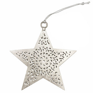 A silver metal star-shaped ornament with intricate cutout patterns, suspended from a silver hanging string against a plain white background.