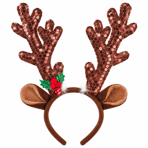 A Christmas reindeer antler headband featuring brown sequined antlers with a green holly and red berry accent, attached to a brown faux-fur trimmed headband with plush brown ears.