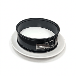 Black and silver mechanical component on a white background