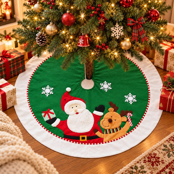 A round green Christmas tree skirt with embroidered Santa Claus, a reindeer, and white snowflakes, displayed under a decorated Christmas tree on a wooden floor with wrapped gifts around it.