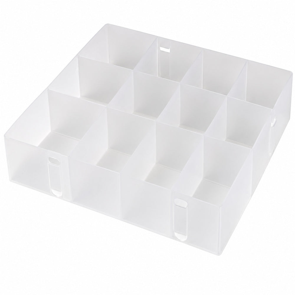 Ordinett 12-compartment drawer organizer neatly arranged inside a modern bathroom drawer, storing cotton pads, cotton swabs, towels, toiletries, brushes, and personal care essentials for organized bathroom storage.