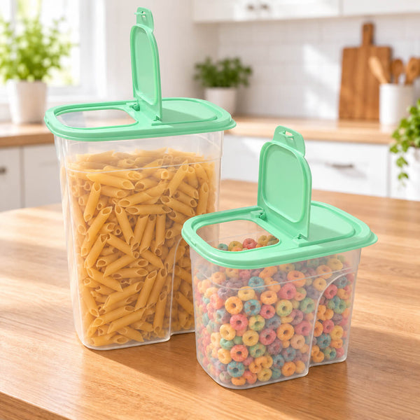 Two clear plastic food storage containers with mint green lids and scoop handles, filled with penne pasta and colorful ring cereal, set on a wooden kitchen counter.
