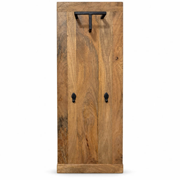 A rustic wooden pegboard with a warm medium-brown wood grain finish and black metal hooks, shown against a plain white background.