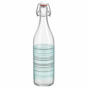 A clear glass swing-top bottle with a white screw cap and metal clasp, featuring a stack of pale green striped glass plates or coasters inside the lower half, on a white background.