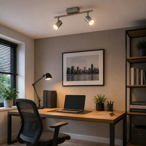 Micasa SHIDO II adjustable LED spotlight bar illuminating a modern home office workspace.