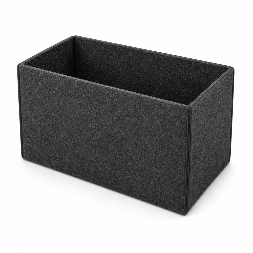 Dark gray felt storage box filled with children's toys, books, and plush animals on a table in a modern kids' bedroom with organized toy storage and playful décor.