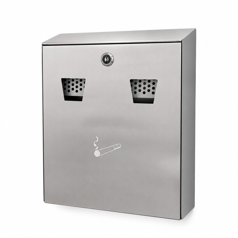 A stainless steel wall-mounted dual trash/recycling bin with a cigarette lighter icon, mounted on a beige stucco wall next to an outdoor patio with tables and plants.