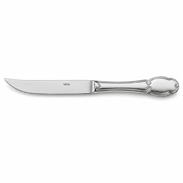 A single silver steak knife with a serrated blade and an ornate polished handle, shown horizontally on a clean white background. The brand name 'MESA' is printed on the blade.