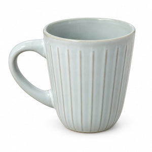 A light blue-gray ceramic mug with a fluted vertical ribbed design and a curved handle, shown on a plain white background.
