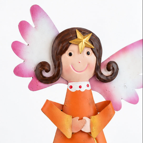 A whimsical handcrafted angel figurine with pink and white wings, brown hair, a gold star on its head, and an orange dress, set against a plain white background.