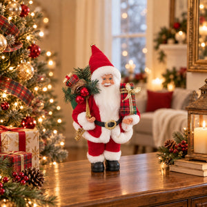 A Santa Claus figurine standing on a wooden table in a cozy holiday living room, holding a plaid sack of coins and wrapped gifts, with a decorated Christmas tree and warm lights in the background.