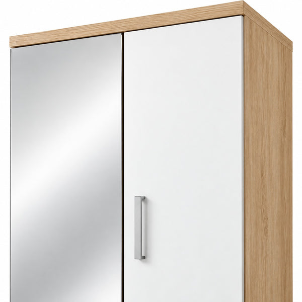 A modern wall-mounted wardrobe or cabinet with two doors, one mirrored and one white with a vertical silver handle, featuring a light oak wood grain frame and top.