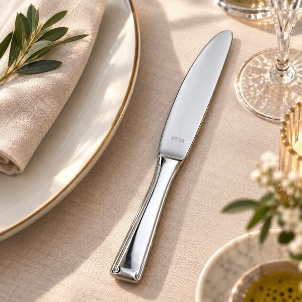 VEGA table knife in elegant dining table setting