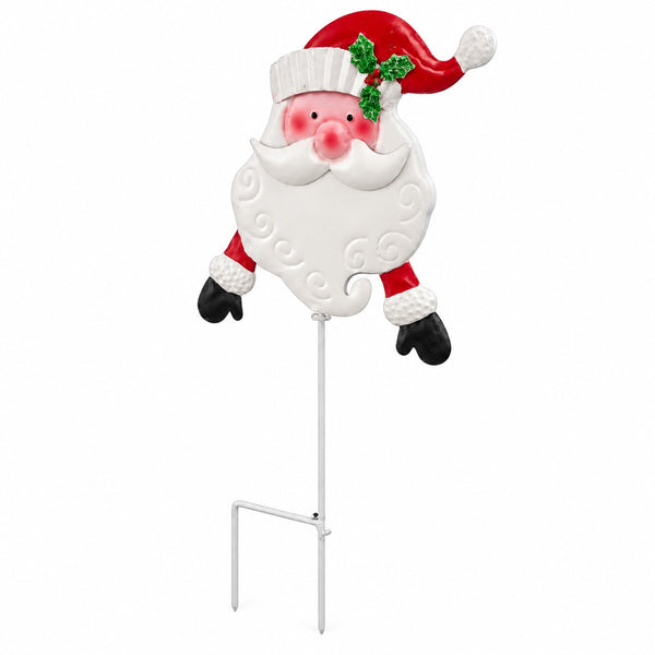 A festive metal Santa Claus yard stake sign with a white textured beard, red hat with green holly accents, pink cheeks, and black mittens, mounted on a white wire stake against a plain white background.