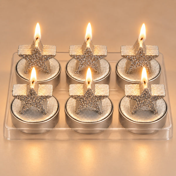 Migros set of 6 silver star Christmas candles on white background