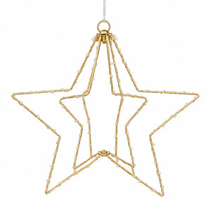 A gold wire star-shaped Christmas ornament with small clear bead accents along the edges, suspended against a plain white background.