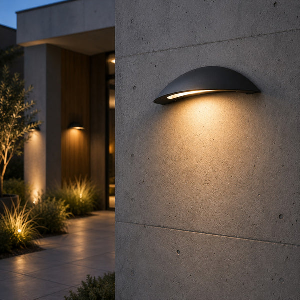 Massive Pori architectural outdoor wall light mounted on a luxury concrete wall with elegant downward illumination.