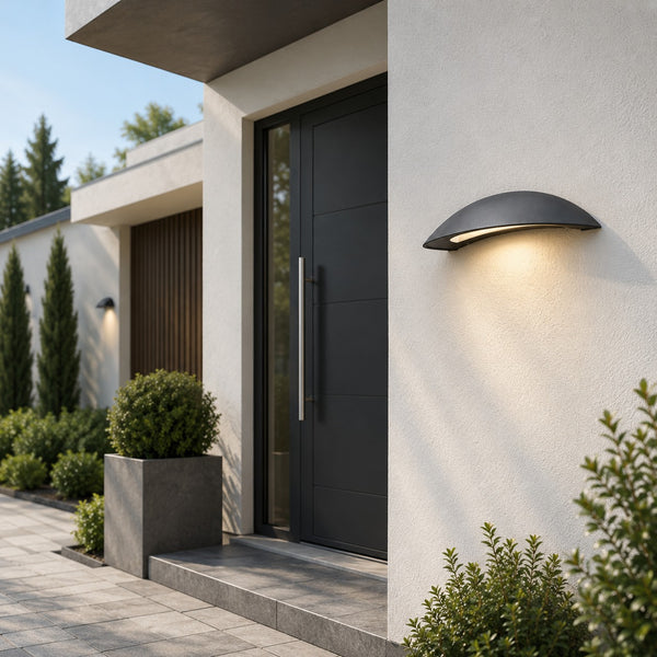 Massive Pori outdoor wall light installed beside a modern villa entrance during dayligh
