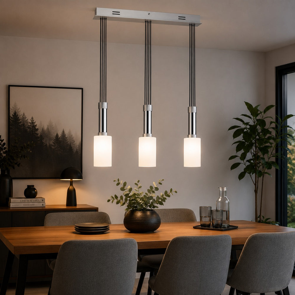 Micasa MILA 3-light pendant light installed above a modern dining table.

