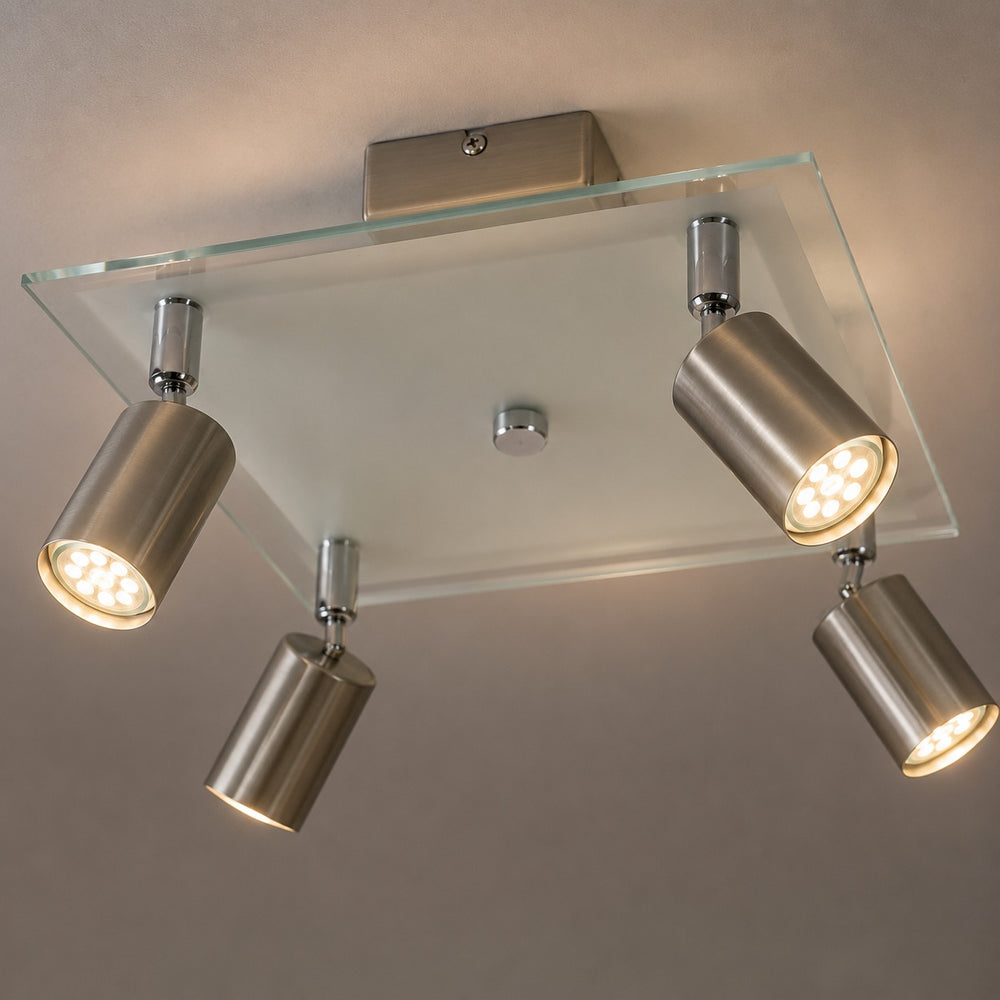 Close-up view of the Micasa SHIDO II satin nickel adjustable GU10 LED spotlight heads with warm white illumination.
