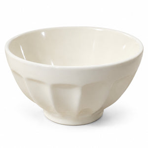 An off-white ceramic bowl with a textured, scalloped exterior and a smooth, rounded interior, shown on a clean white background.