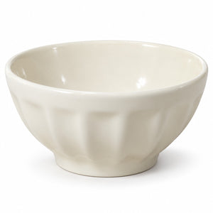 An off-white ceramic bowl with a fluted exterior and smooth interior, shown on a clean white background.
