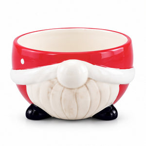 A Santa Claus-themed ceramic planter shaped like the back of Santa's sleigh, featuring a red body, white beard and pom-pom, and black hooves, shown on a white background.
