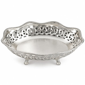 A silver filigree serving tray with scalloped edges, decorative cutout patterns, and three small feet, shown on a clean white background.