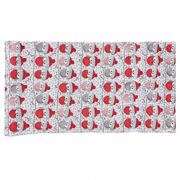 A rectangular fabric item, likely a blanket or towel, featuring a repeating pattern of cartoon snowman faces wearing red and gray winter hats on a white background with light gray polka dots.