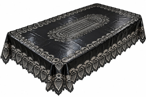 A black tablecloth with an intricate white lace pattern and a scalloped ruffled border, shown from an elevated angle on a white background.