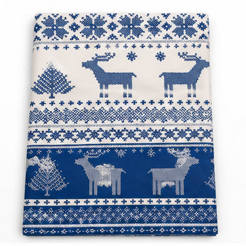 A square fabric item, likely a gift wrap, napkin, or small scarf, featuring a classic Nordic/Sweater-style Christmas pattern in navy blue and off-white. The design includes reindeer, Christmas trees, and geometric borders.