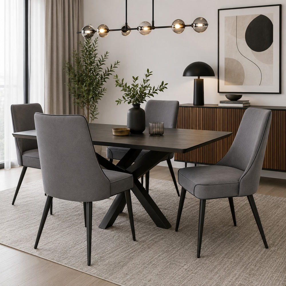 Modern grey upholstered dining chairs around a contemporary dining table in a stylish dining room.