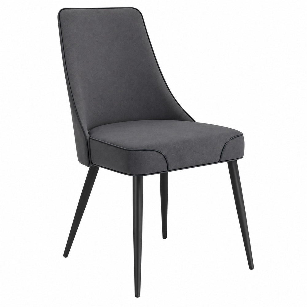 Modern grey upholstered dining chairs around a contemporary dining table in a stylish dining room.