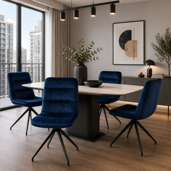 Contemporary apartment dining area featuring navy blue upholstered dining chairs.