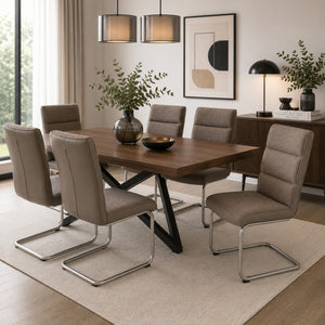 Taupe cantilever dining chairs around a modern dining table.