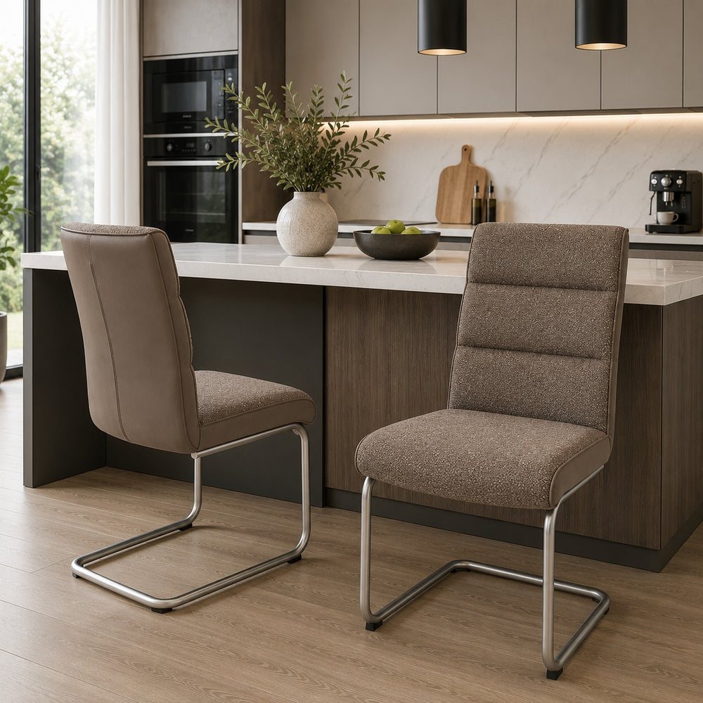 Taupe cantilever dining chairs in a contemporary kitchen.