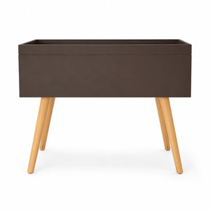 A modern rectangular storage bench or side table with a dark brown faux-leather top and four light natural wood legs, shown against a plain white background.