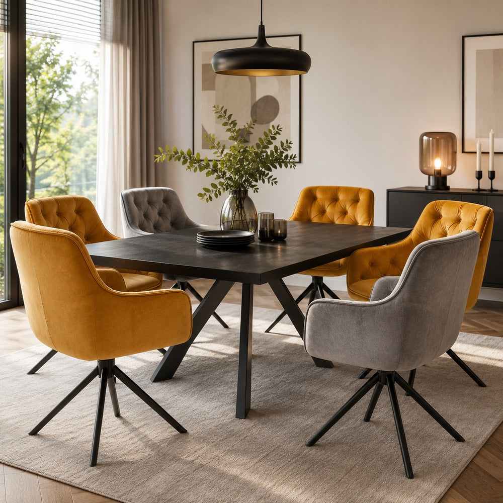 Mustard and grey velvet swivel dining chairs displayed together around a contemporary dining table.
