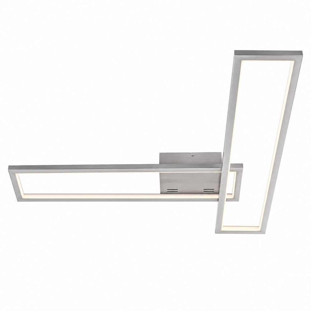 Nino LIMEA geometric LED ceiling light in a modern dining room.
