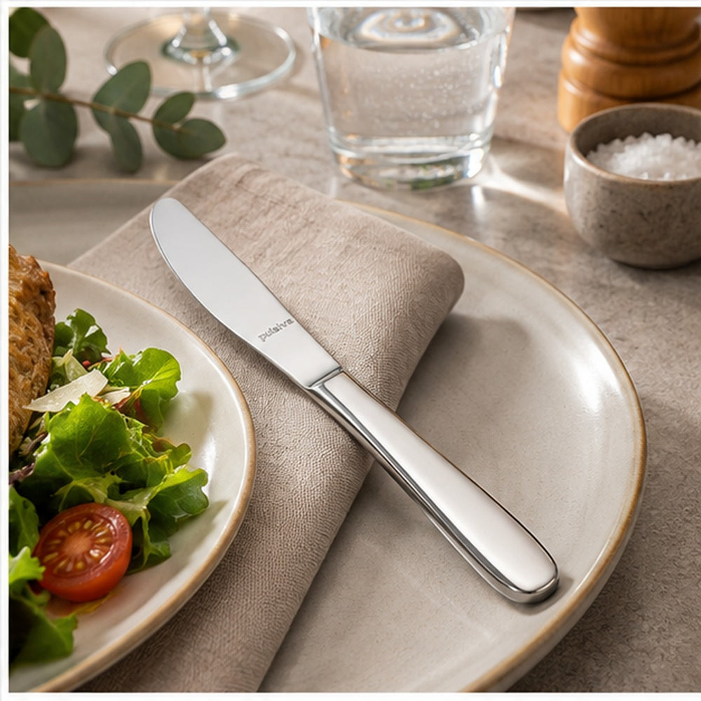 A stainless steel dinner knife with the brand name 'J.A.