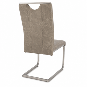 Rear view of the Reality Trieste dining chair showing the integrated brushed steel handle.