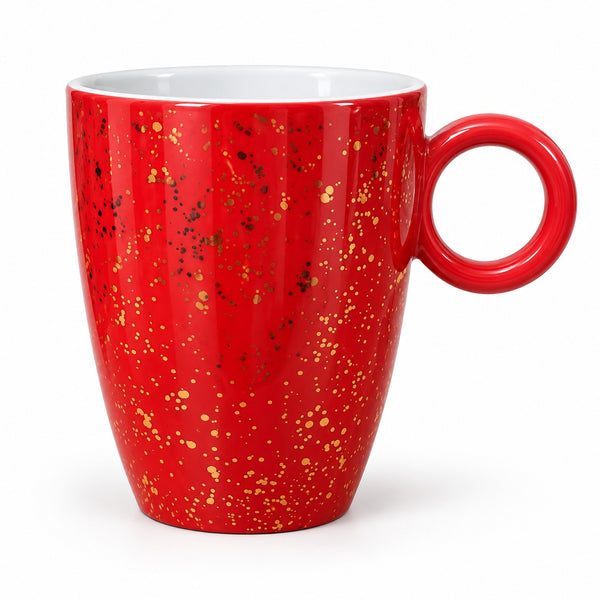 A red ceramic coffee mug with a gold and black speckled pattern and a white interior, shown on a white background.
