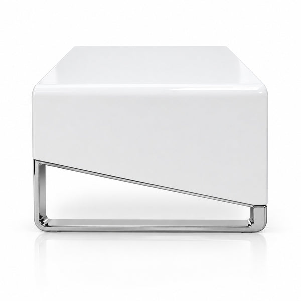 A modern white rectangular coffee table with a glossy finish and a geometric chrome metal base, shown on a clean white background.