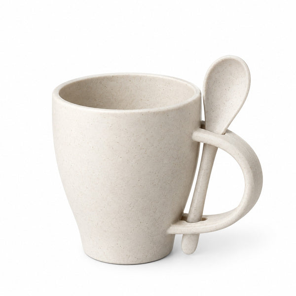 A light beige speckled ceramic mug with a handle shaped like a spoon, shown on a clean white background.