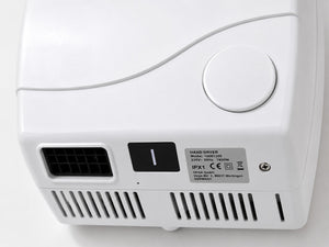 Close-up of VEGA hand dryer air outlet and push button